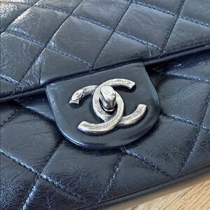 CHANEL Black Quilted Leather Mini Top-Handle Bag with Silver CC